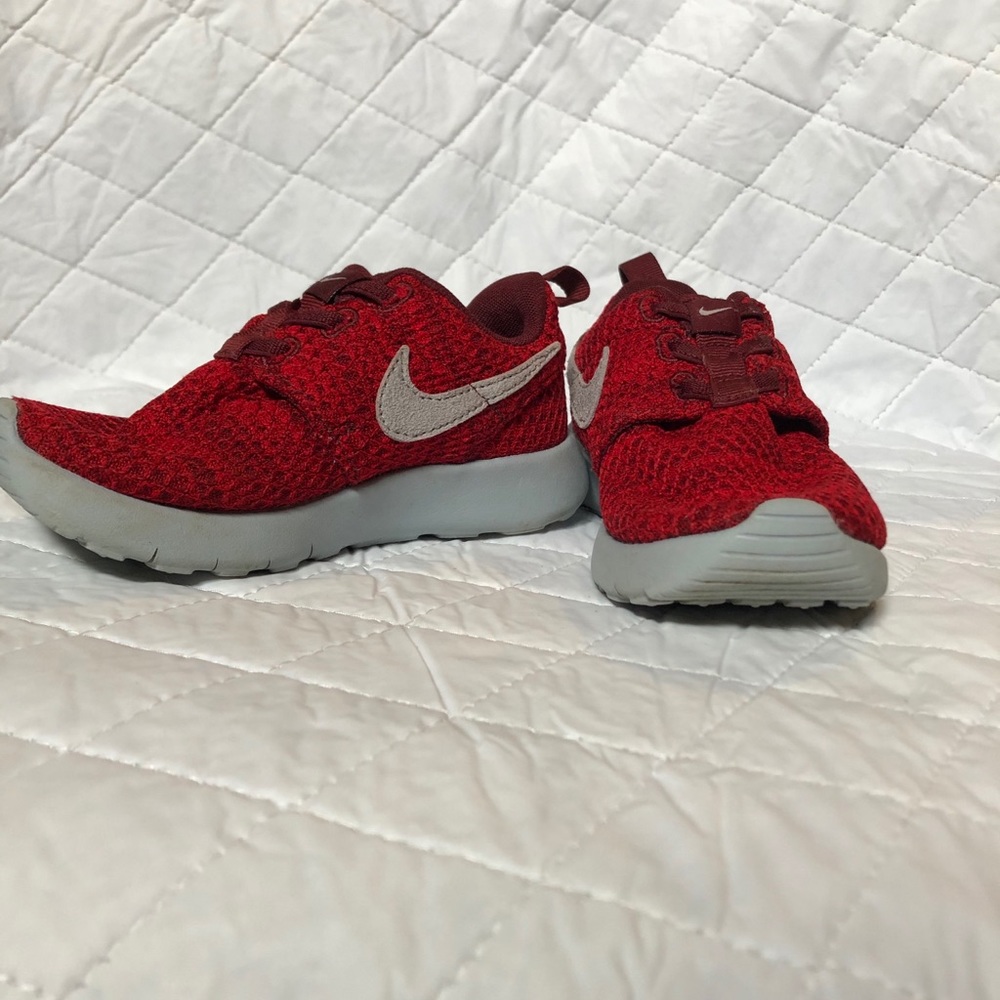 Boys size 10 Nike red slip-on shoes